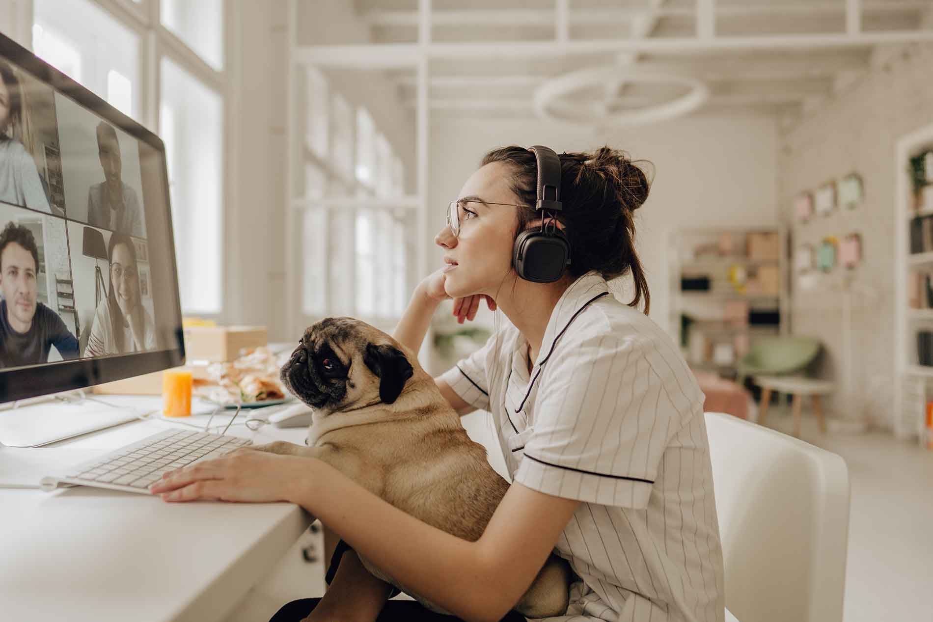 Nurse with dog at computer